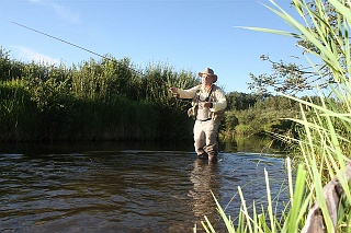 Waders, a fising hat and UV protection shirts round out an angler's outfit