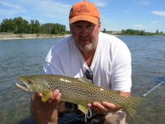 Perry McCormick with a hefty brown trout