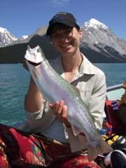 A beautiful Maligne Lake rainbow caught by Jolene, and the place where the double shrimp fly was born.